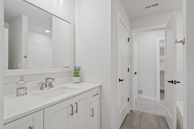 bathroom featuring vanity