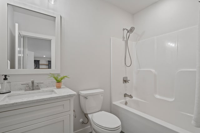 full bathroom featuring vanity, toilet, and tub / shower combination