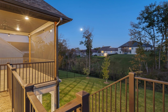 view of yard at dusk