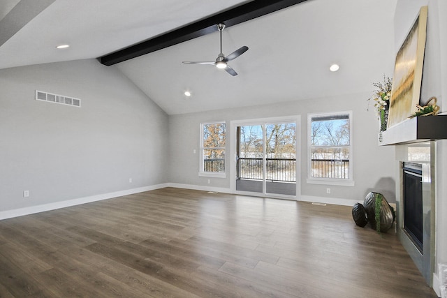 unfurnished living room with vaulted ceiling with beams, ceiling fan, and dark hardwood / wood-style flooring