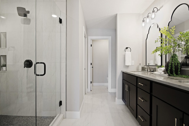 bathroom featuring vanity, toilet, and walk in shower