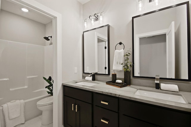 full bathroom with shower / bathing tub combination, vanity, toilet, and tile patterned flooring