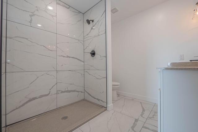 full bathroom with toilet, marble finish floor, a marble finish shower, baseboards, and vanity