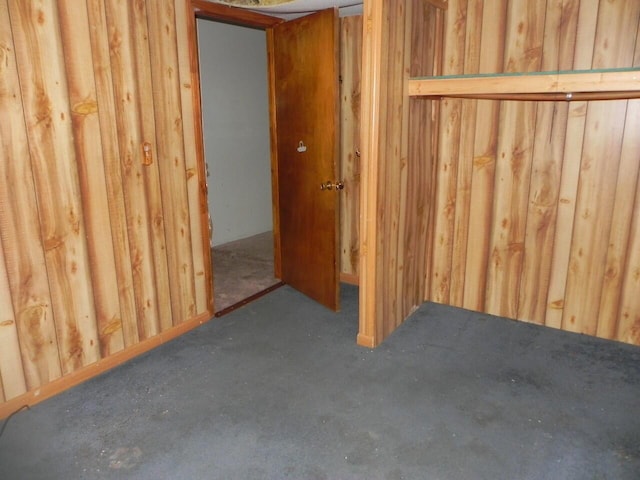 interior space featuring wooden walls