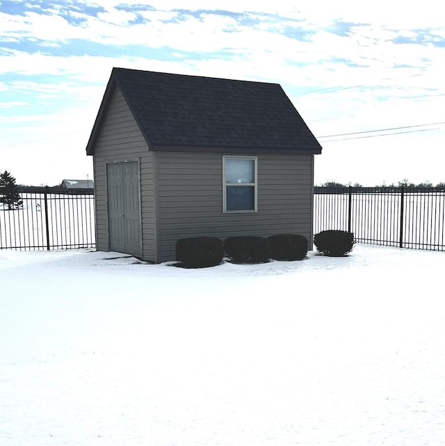 view of snow covered garage