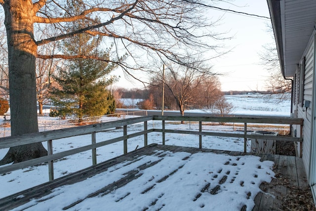 view of snow covered deck