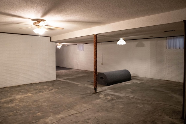 basement featuring ceiling fan