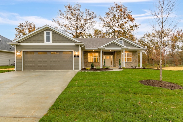 craftsman-style house with a garage and a front yard