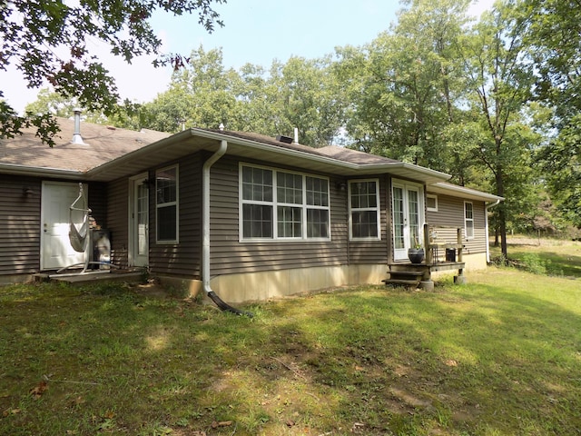 exterior space with a lawn