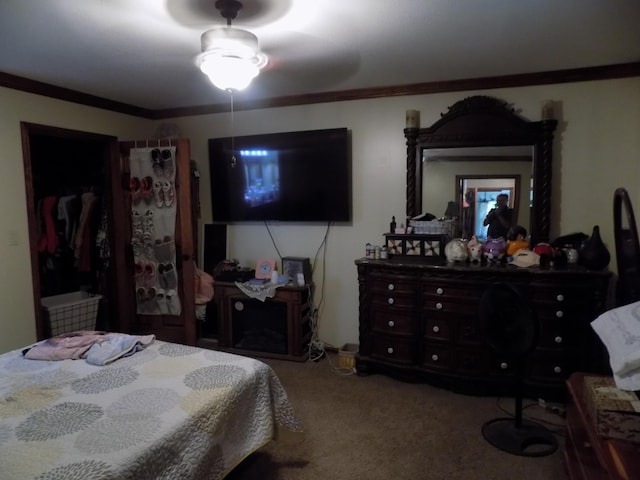 carpeted bedroom with crown molding