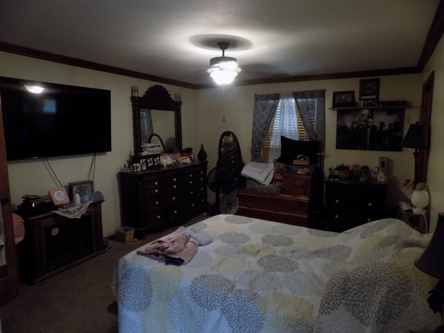 bedroom featuring carpet, ceiling fan, and ornamental molding