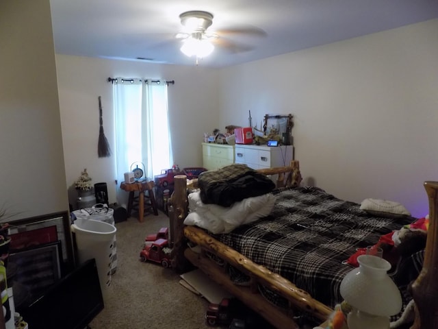 bedroom featuring ceiling fan and carpet floors