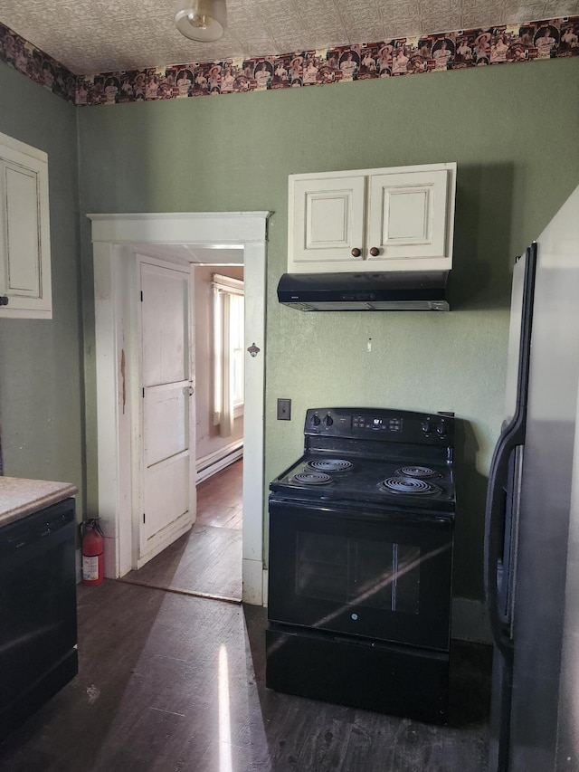 kitchen with black appliances, white cabinetry, dark wood-type flooring, and a baseboard heating unit