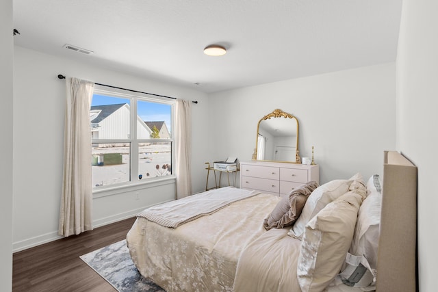 bedroom featuring dark wood-type flooring