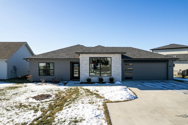 view of front of home with a garage