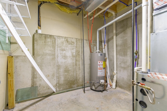 utility room featuring water heater