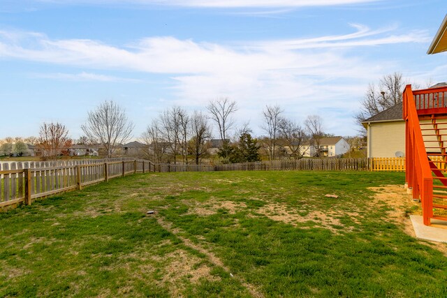 3103 Woods Crossing Dr, Columbia, MO 65202 - view of yard with a fenced backyard and stairway