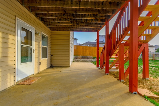 3103 Woods Crossing Dr, Columbia, MO 65202 - view of patio / terrace with stairs and fence