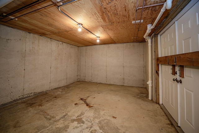 basement with wooden ceiling