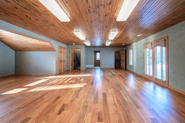 interior space with wooden ceiling and light wood-type flooring