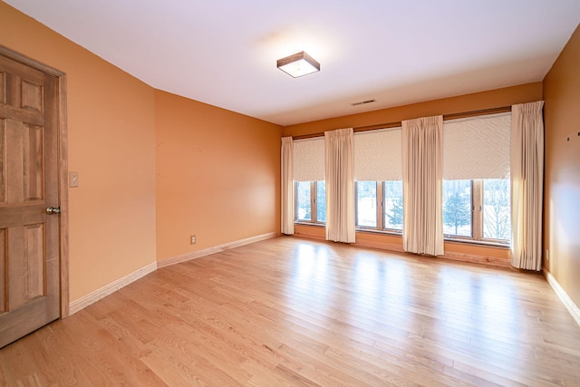 empty room featuring light hardwood / wood-style flooring