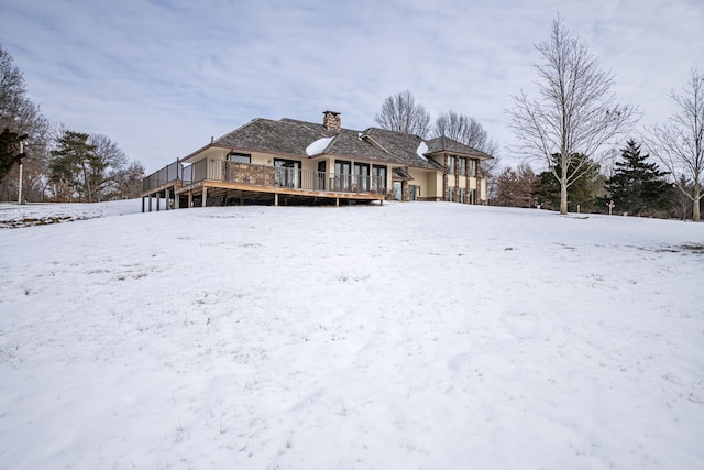 exterior space featuring a wooden deck