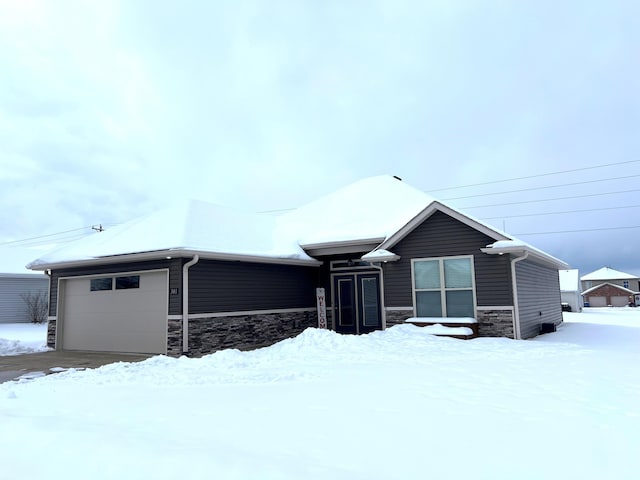 single story home featuring a garage