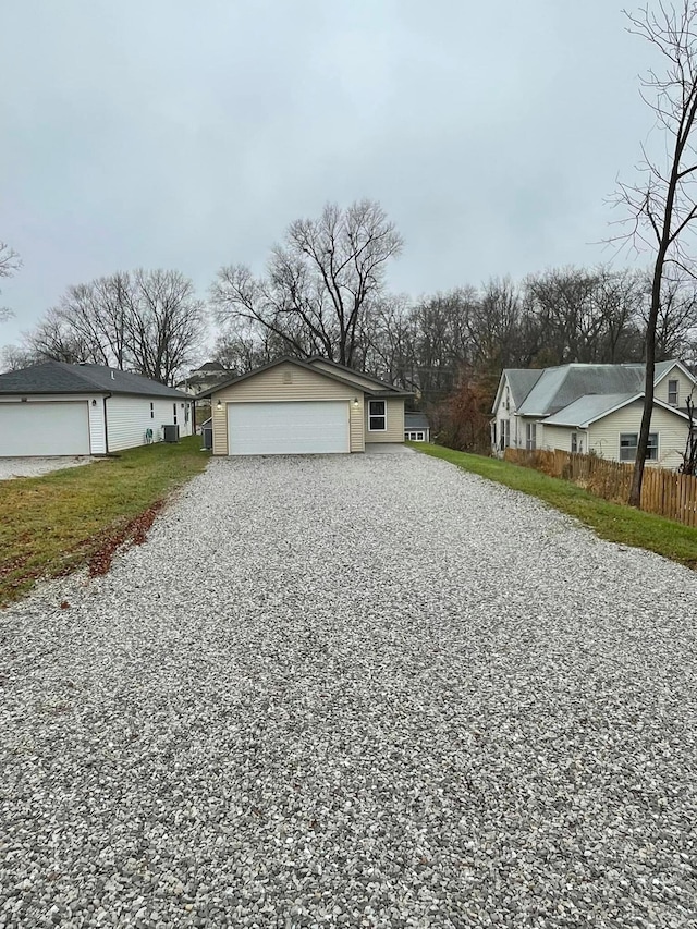 view of property exterior with a garage