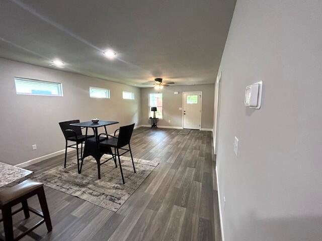 908 7th St, Boonville, MO 65233 - dining room featuring baseboards, ceiling fan, dark wood-style floors, and recessed lighting
