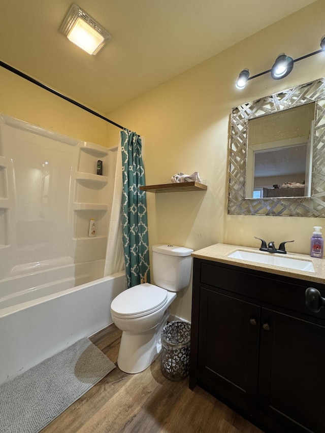 full bathroom with toilet, vanity, shower / bath combination with curtain, and hardwood / wood-style flooring