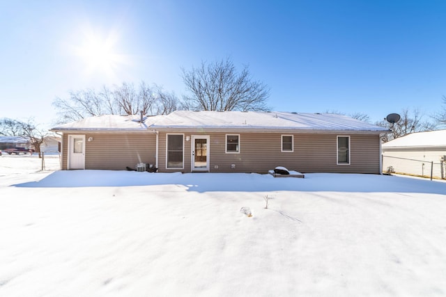 view of snow covered house