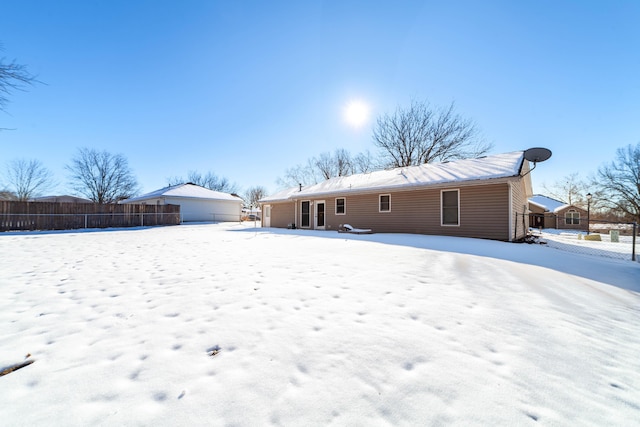 view of snow covered house