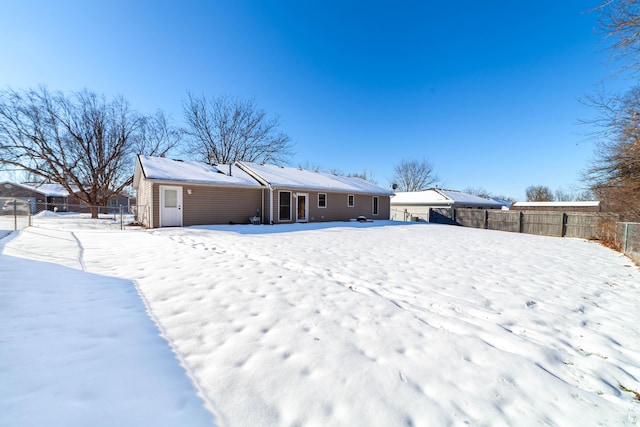 view of snow covered house