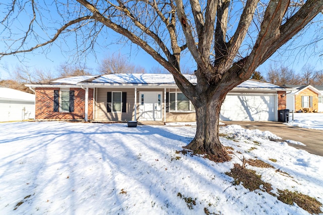 single story home with a garage