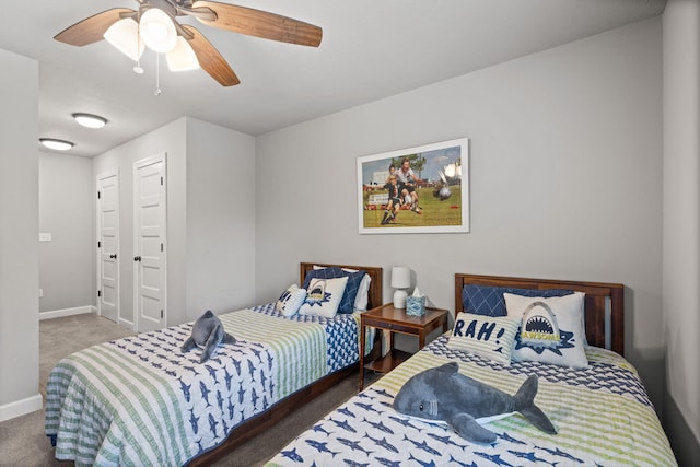 carpeted bedroom with ceiling fan