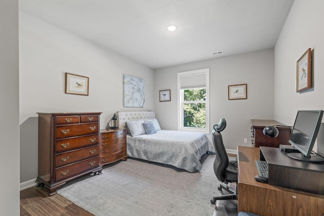 bedroom featuring hardwood / wood-style flooring