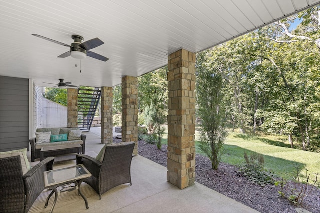 view of patio with outdoor lounge area and ceiling fan