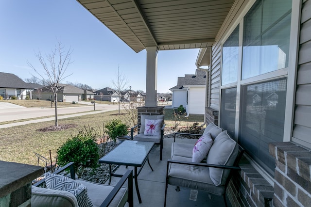 balcony featuring a porch