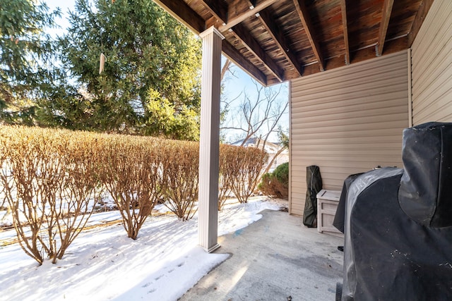 view of snow covered patio