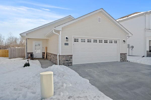 view of front of home with a garage