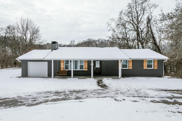 single story home featuring a garage