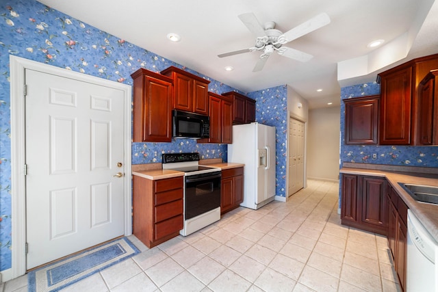 kitchen with ceiling fan, white appliances, and light tile patterned flooring