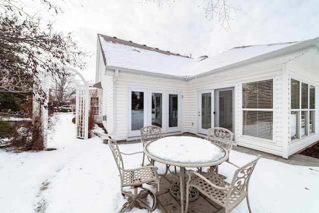 view of snow covered patio