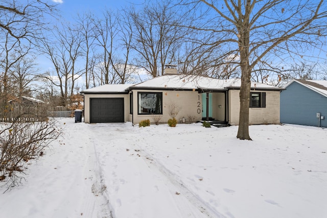 single story home with a garage