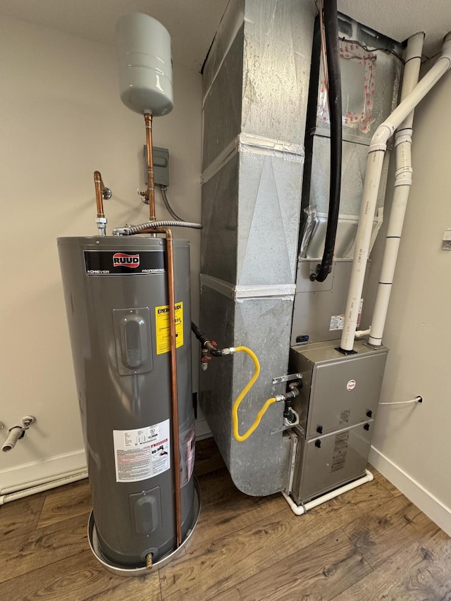 utilities featuring water heater and heating unit