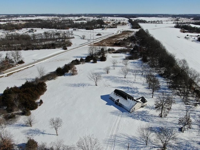 snowy aerial view with a rural view