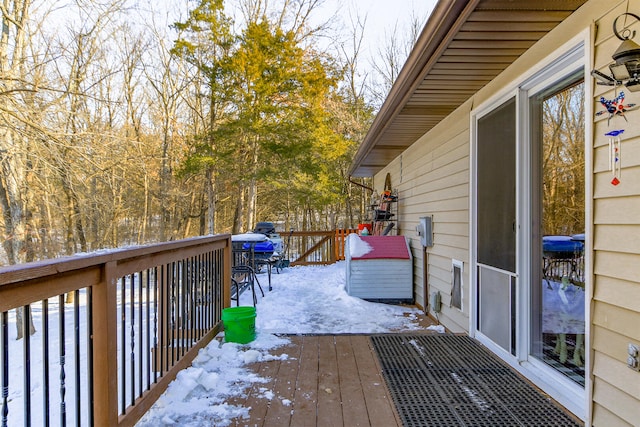 view of snow covered deck