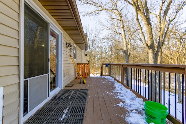 view of snow covered deck