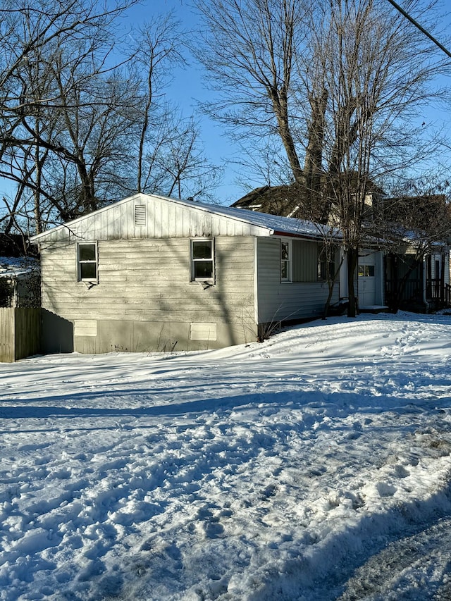 view of snow covered property