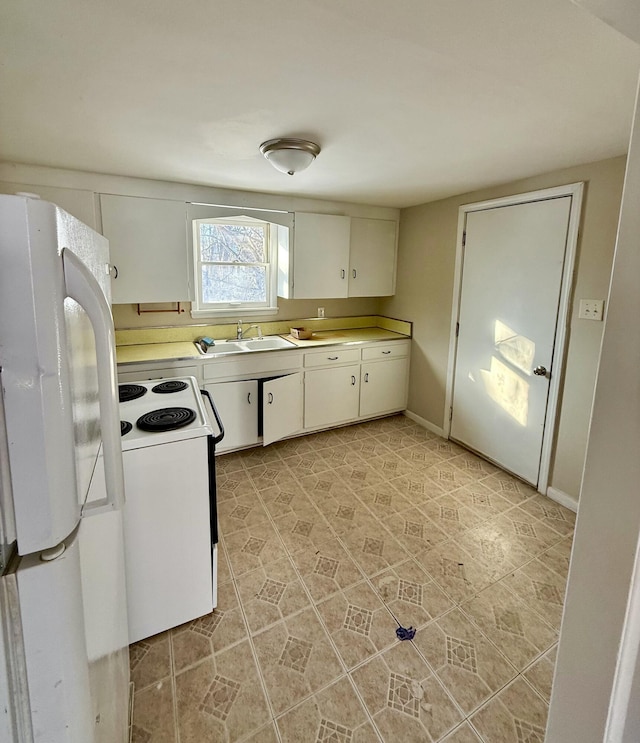 kitchen featuring white cabinets, white appliances, and sink